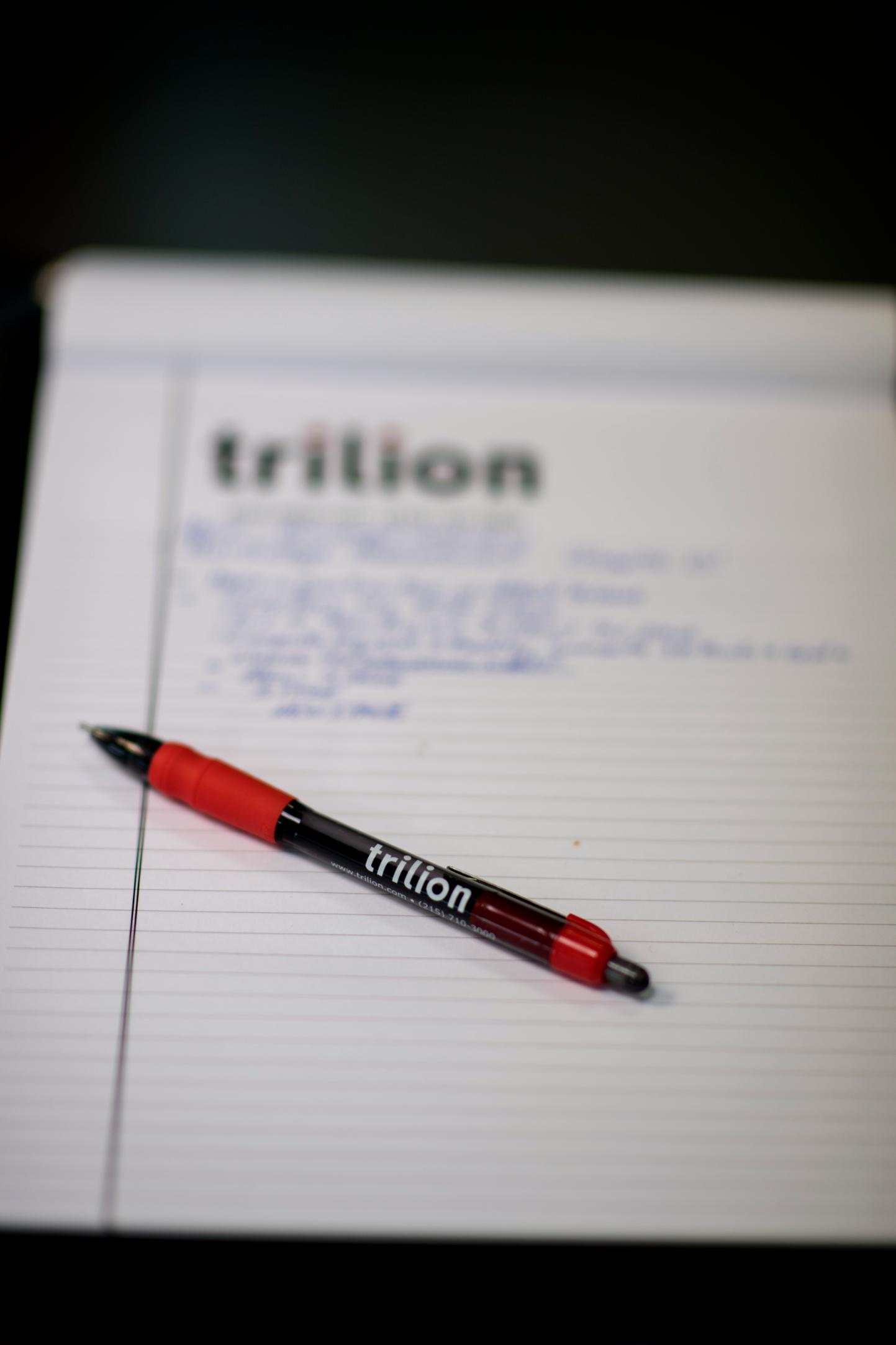 Trilion notebook with red Trilion pen