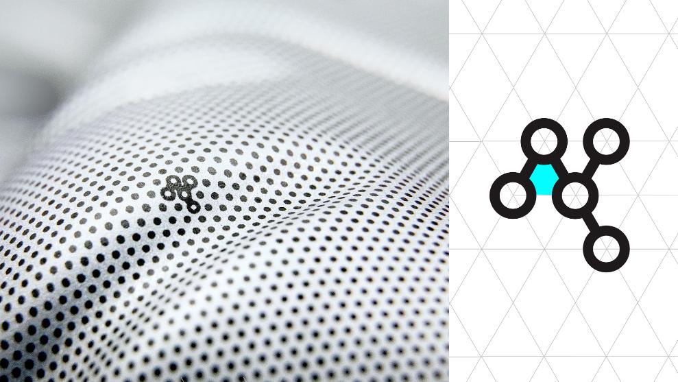 ARGUS symbol on black and white dot mesh